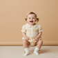 Butter Yellow Smocked Button Romper - Makemake Organics