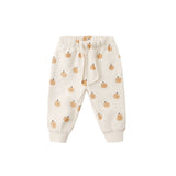 Smiley Pumpkin Relaxed Sweatpants - Quincy Mae