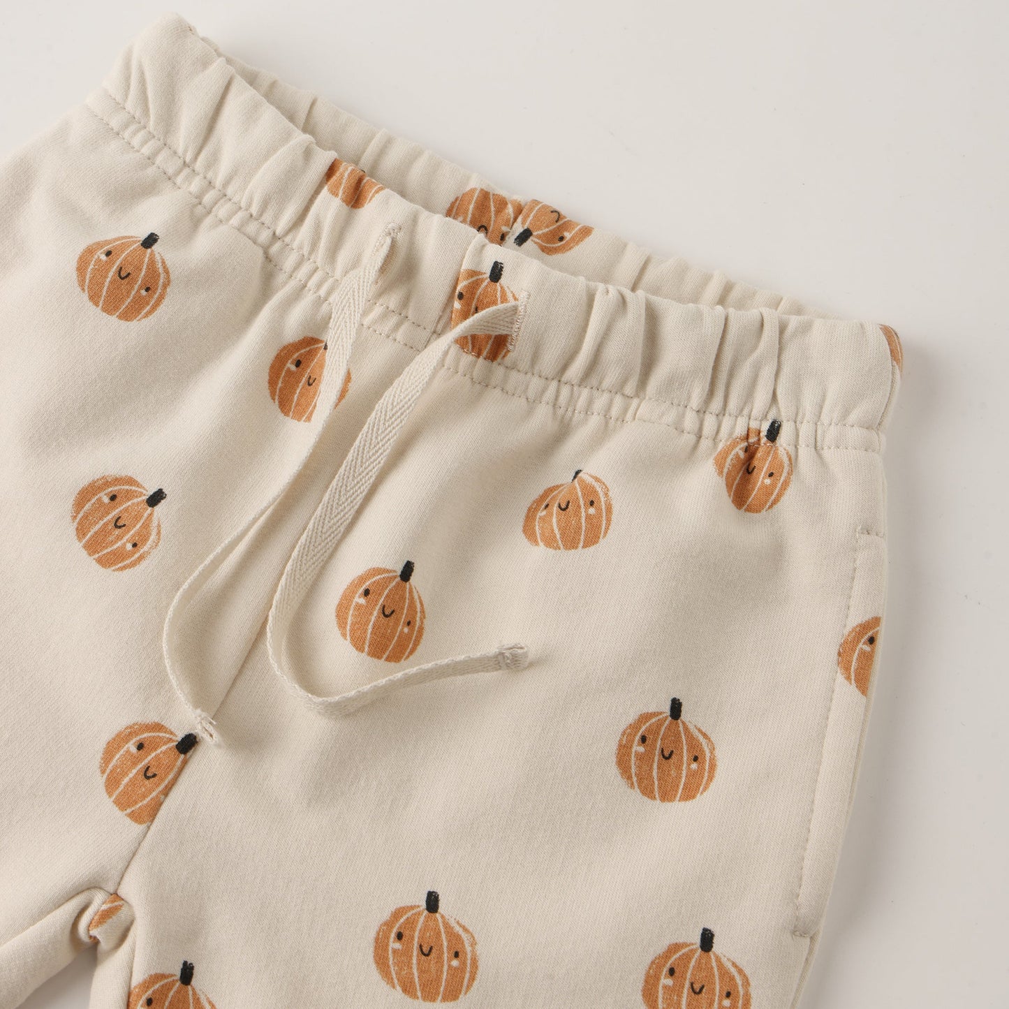 Smiley Pumpkin Relaxed Sweatpants - Quincy Mae